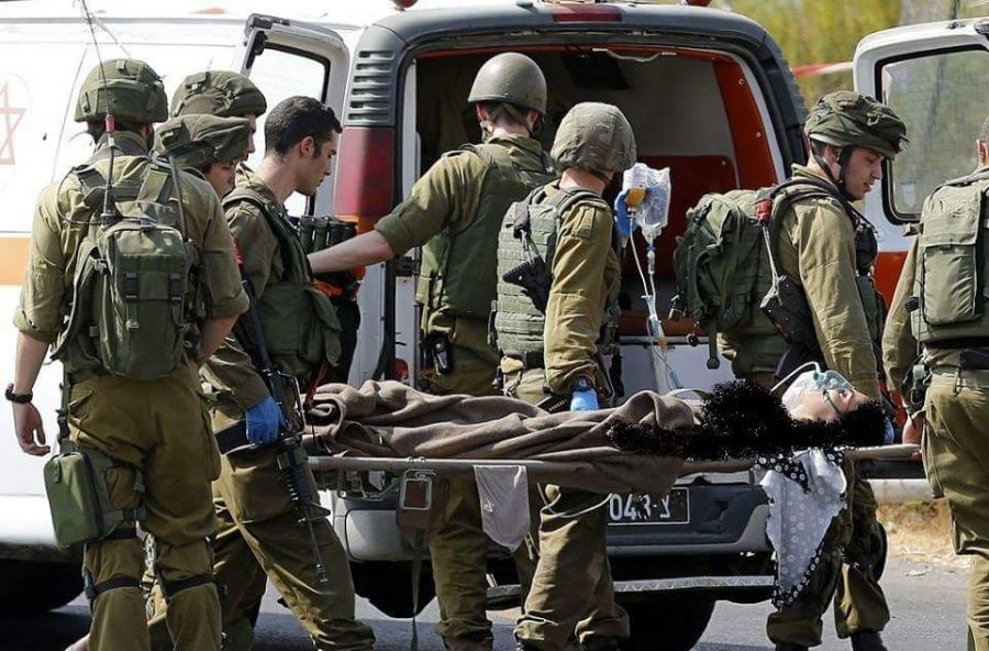 بالصور: اصابة فتاة و استشهاد قريبها في الخليل